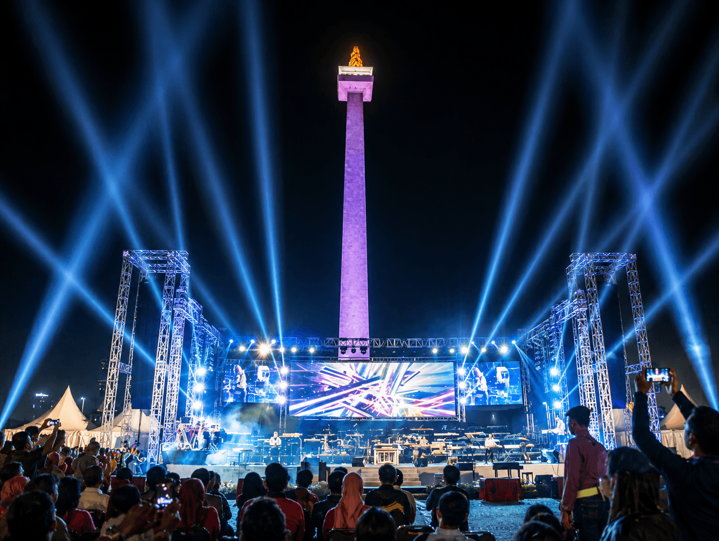 Large-scale outdoor concert production at Monas, Jakarta